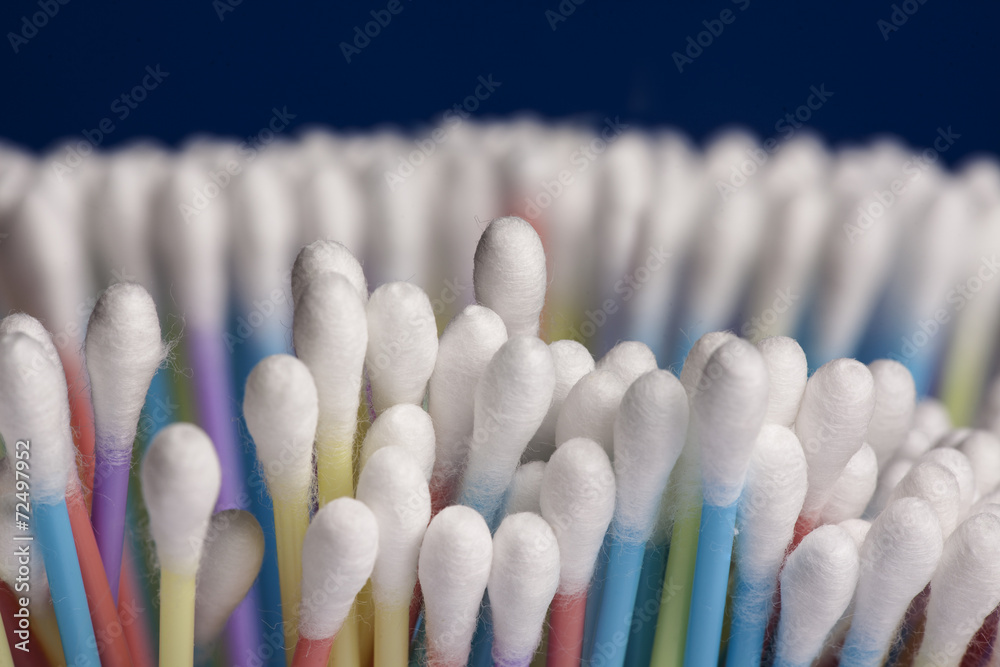 A pile of cotton swabs in different colors A pile of cotton swabs in different colors