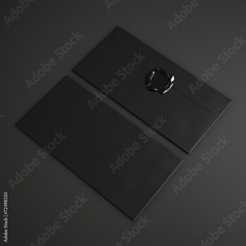 Two black envelopes with wax seal