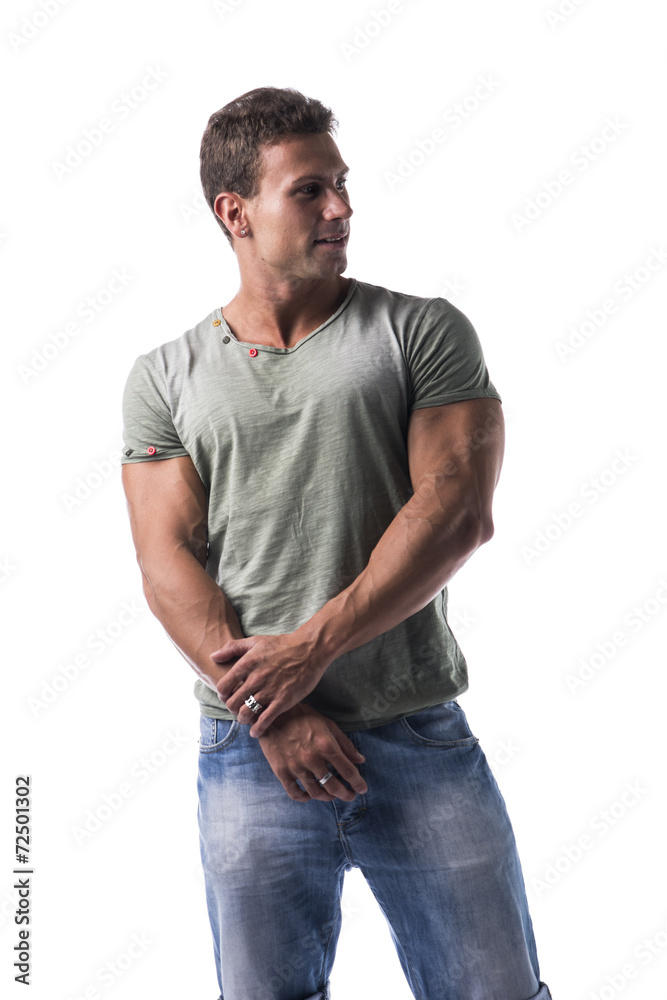 Fototapeta premium Handsome young man smiling isolated on white looking to a side