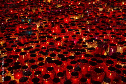 Many lighted candles