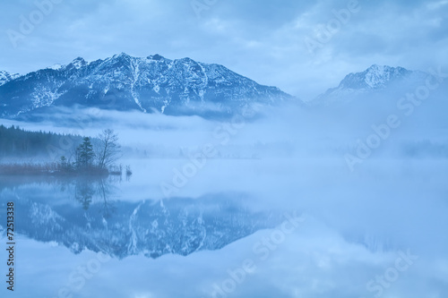 Karwendel Alps reflected in lake Barmsee © Olha Rohulya