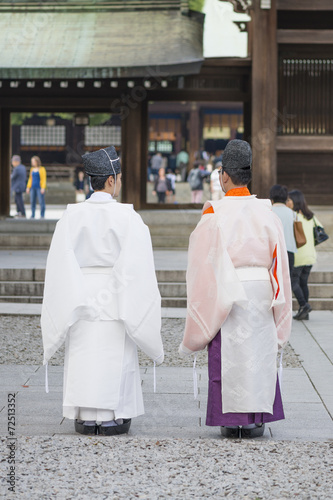 Fotografie, Obraz Shinto priests at the Meiji Shrine in Tokyo, Japan.