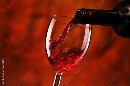 Pouring red wine