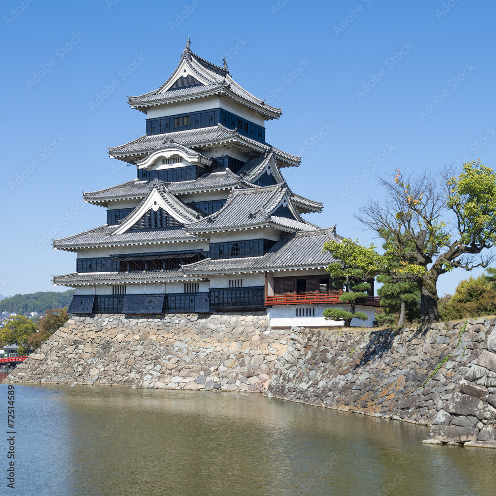 Matsumoto Castle - The keep and moat. Matsumoto, Nagano, Japan. Matsumoto Castle - The keep and moat. Matsumoto, Nagano, Japan.