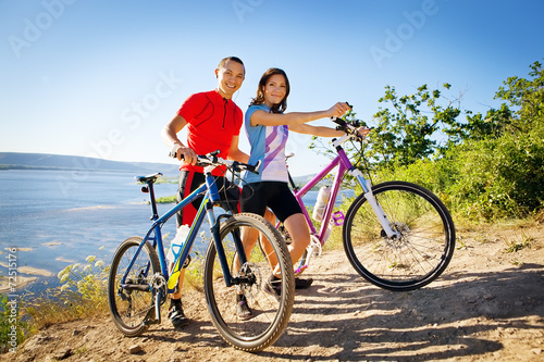 happy couple on bicycles