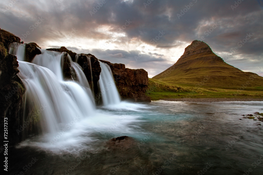 Waterfall with volcano in Iceland Waterfall with volcano in Iceland