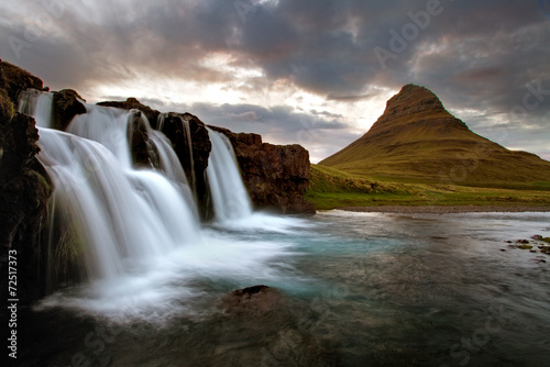 Waterfall with volcano in Iceland