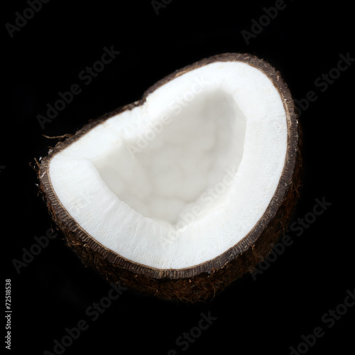 Coconut on black background