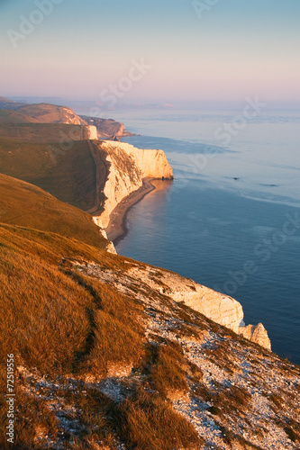 Evening light on the cliffs of Jurassic coast in Dorset, UK.