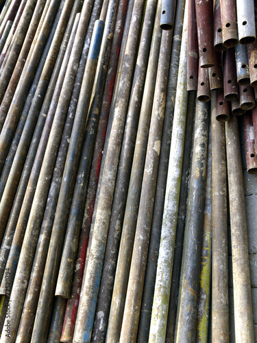 Rusty old pipes for building scaffold