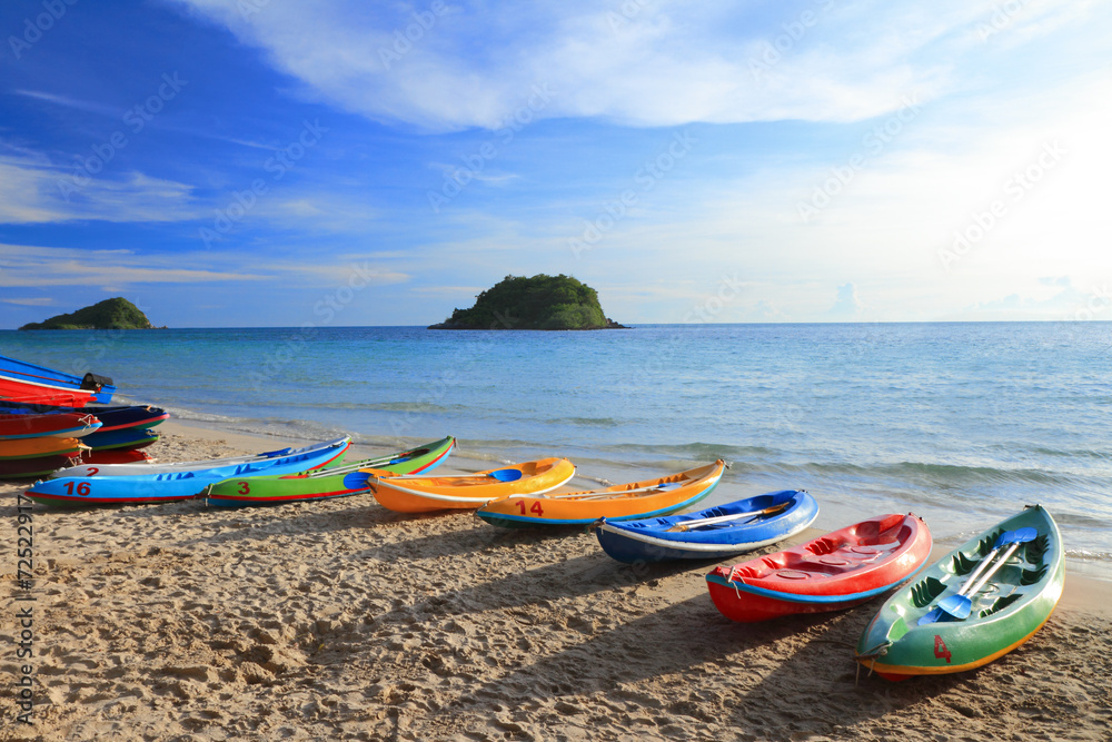 Colorful boats on the tropical beach in Thailand Colorful boats on the tropical beach in Thailand