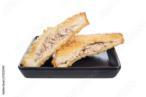 fried tuna sandwich in ceramic plate