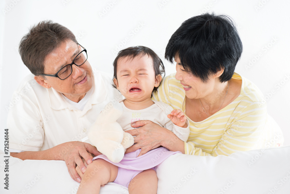 Asian family with crying baby Asian family with crying baby