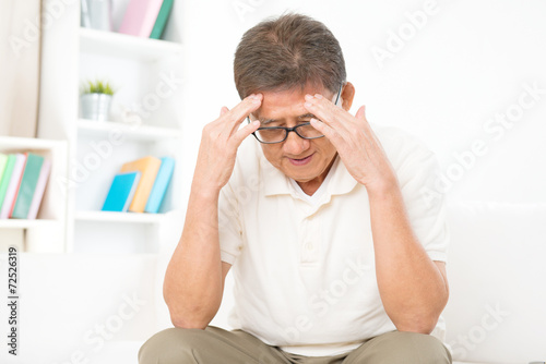 Wallpaper Mural Mature Asian man headache Torontodigital.ca