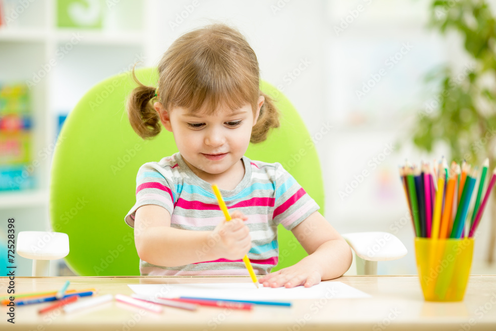 cute child girl drawing with colourful pencils cute child girl drawing with colourful pencils
