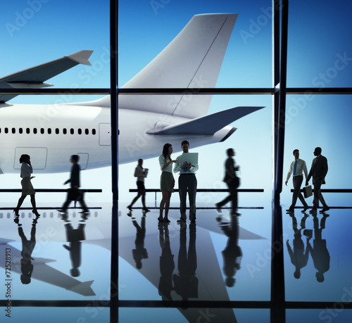 Silhouette Group of Business People with Airplane