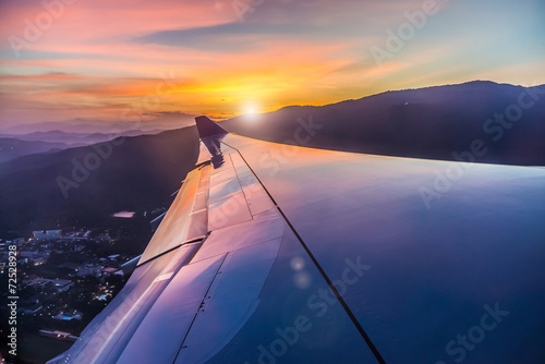 The colorful sunset from an airplane view