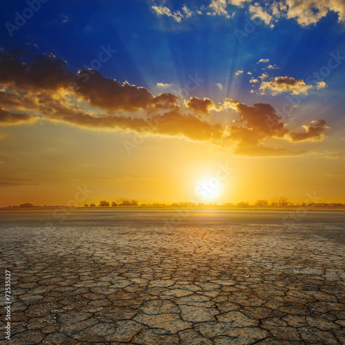 sunset over a dry land