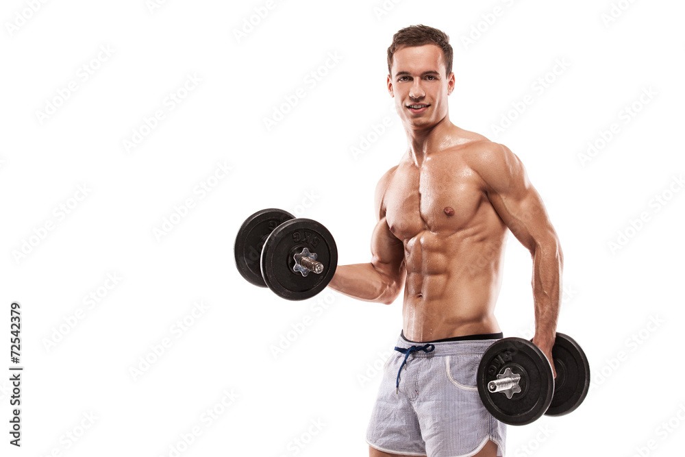 Muscular bodybuilder guy doing exercises with dumbbells Muscular bodybuilder guy doing exercises with dumbbells
