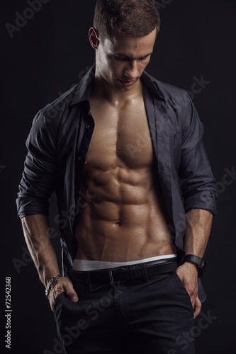 Strong Athletic Man Fitness Model Torso showing six pack abs.