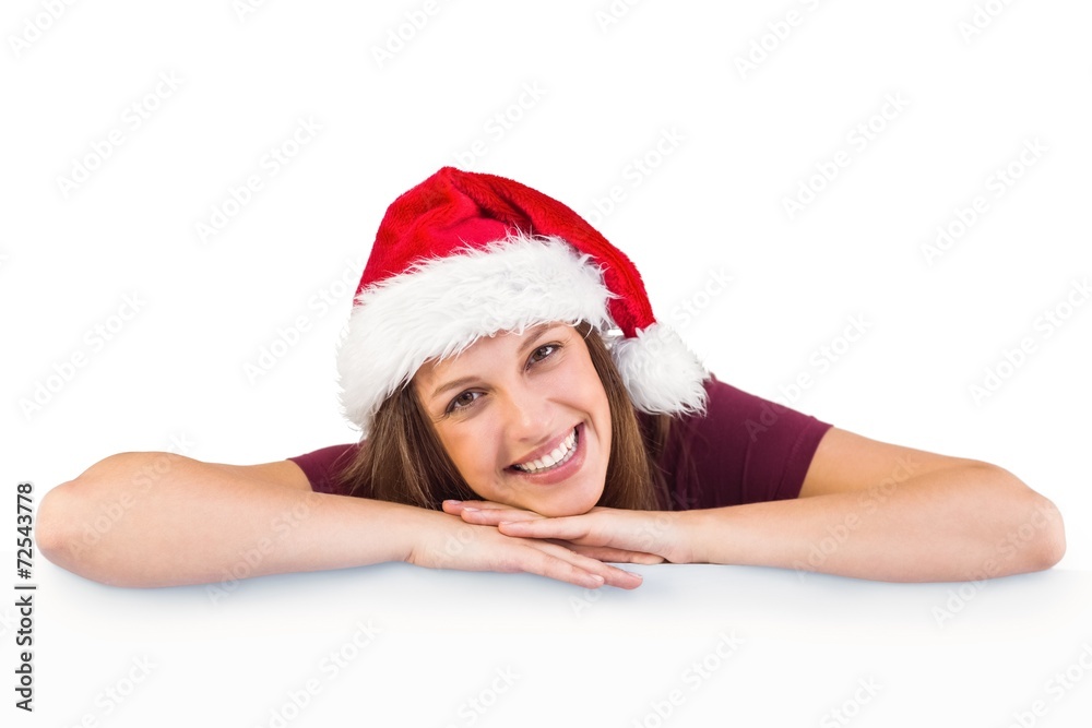 Festive brunette leaning on large poster Festive brunette leaning on large poster
