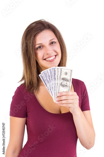 Pretty brunette showing wad of cash