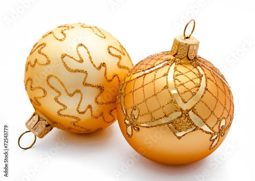 Two golden christmas balls isolated