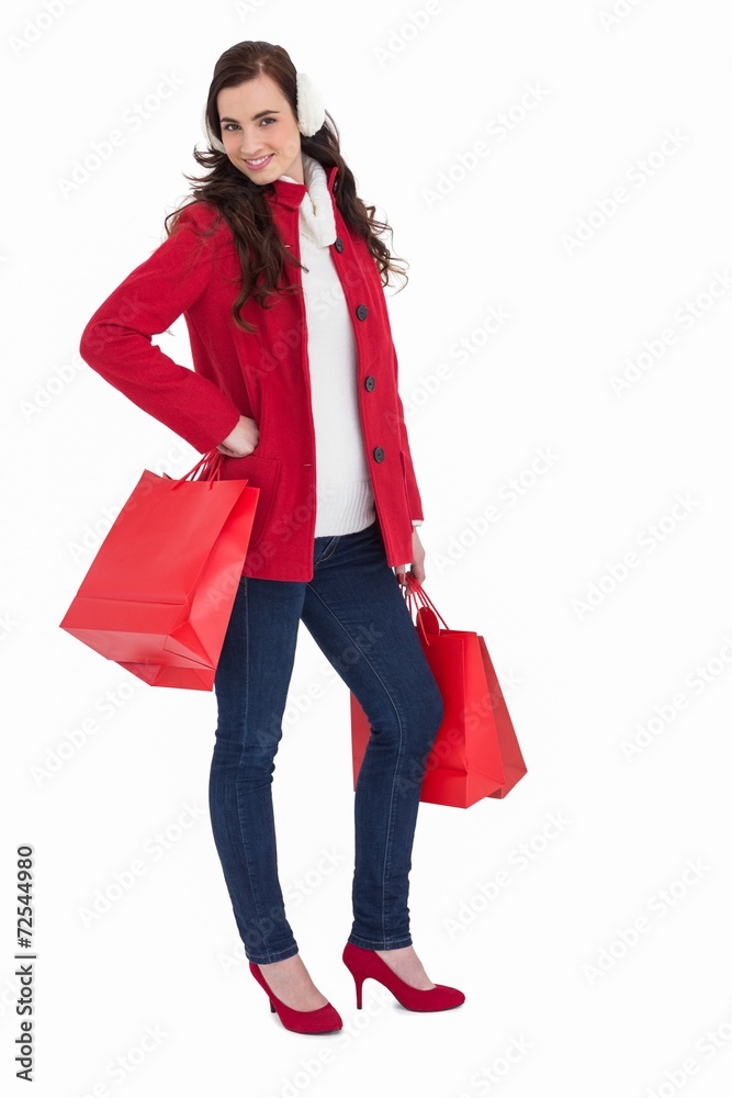 Cheerful brunette in winter clothes posing Cheerful brunette in winter clothes posing
