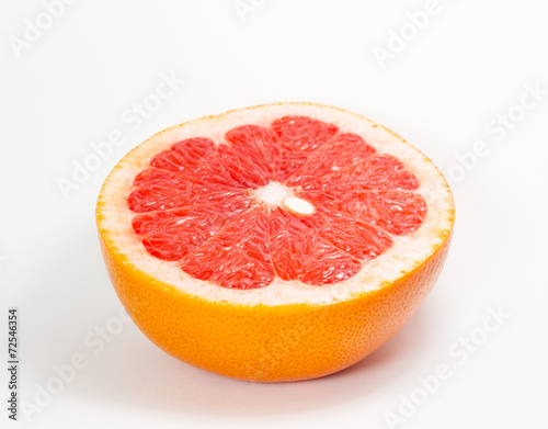Obraz na płótnie Grapefruit isolated on white background w salonie
