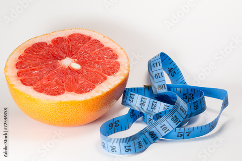 Obraz na płótnie Dieting сoncept - meter and grapefruit w salonie