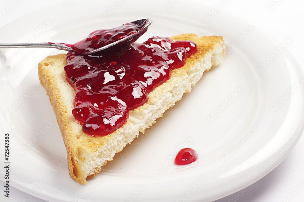 Toast bread with raspberry jam Toast bread with raspberry jam