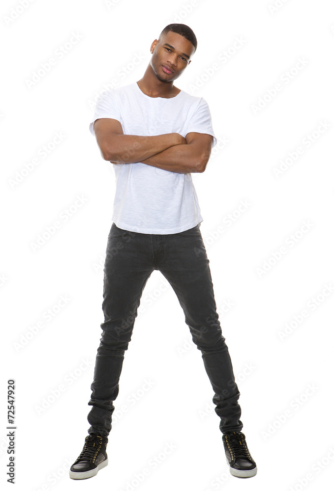 Portrait of a confident young man posing with arms crossed Portrait of a confident young man posing with arms crossed