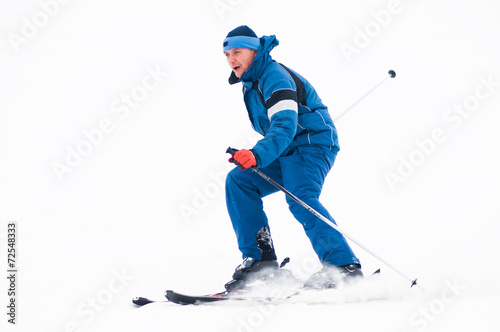 A skier descends from the mountain