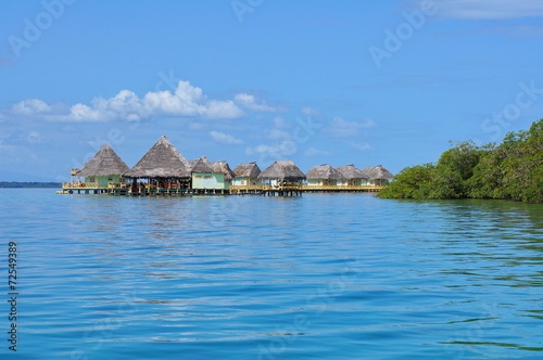 Eco resort over water with thatched cabins Panama