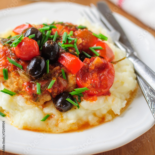 Chicken with Tomatoes, Capsicums, Olives and Chives over Potato