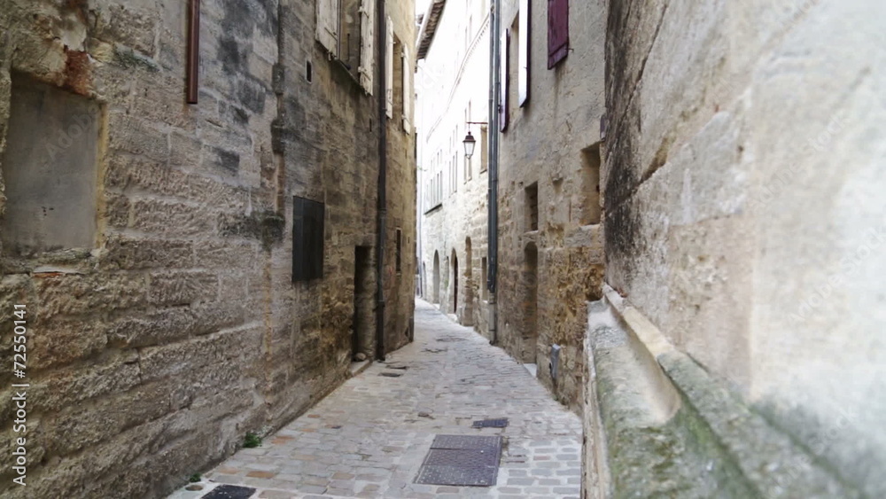 old town near Montpellier, alley with rustic and old buildings old town near Montpellier, alley with rustic and old buildings