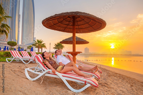 Couple on sun holidays at the Persian Gulf, Abu Dhabi