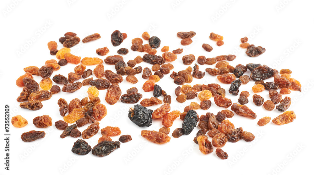Multiple dried fruits raisins spilled over the surface Multiple dried fruits raisins spilled over the surface