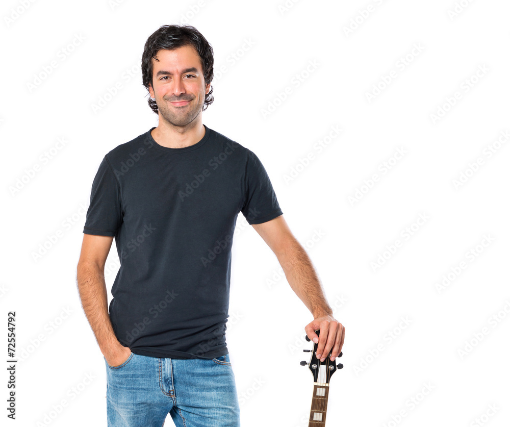 Handsome man with guitar over white background Handsome man with guitar over white background