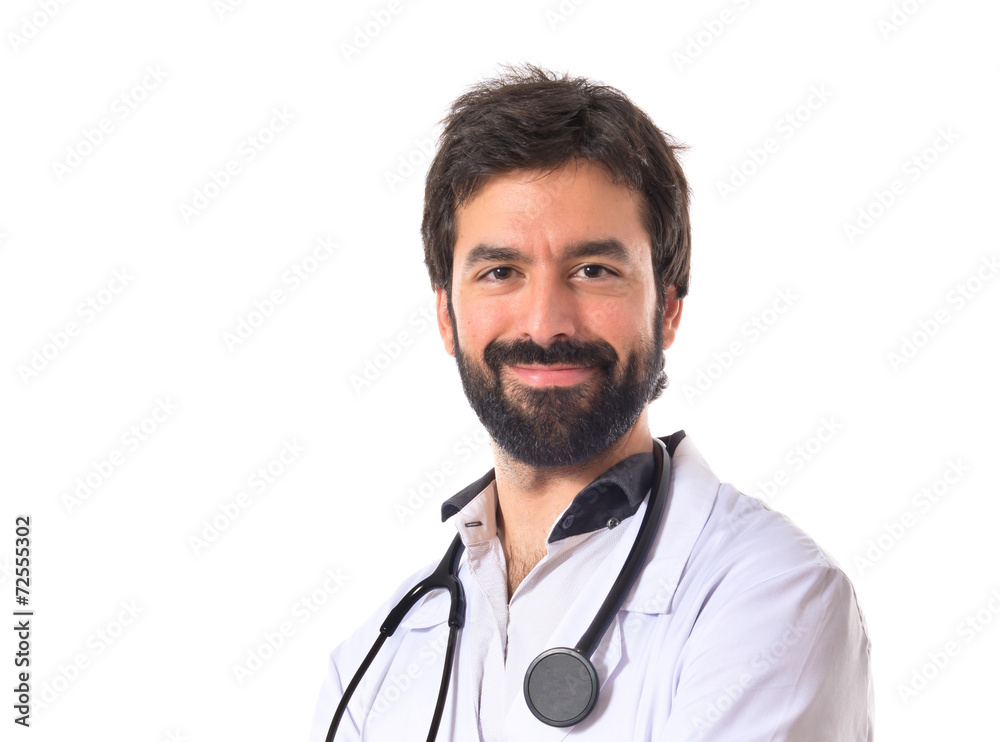 Doctor with his arms crossed over white background Doctor with his arms crossed over white background