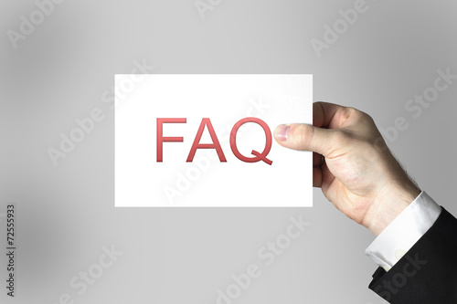 hand showing sign faq frequently asked questions