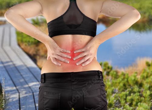 Back pain woman. photo