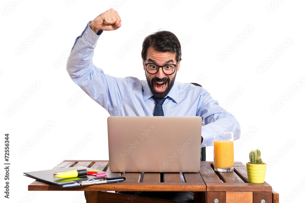 Lucky businessman in his office