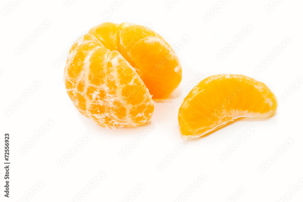 An Orange Slice Next to a Peeled Orange An Orange Slice Next to a Peeled Orange