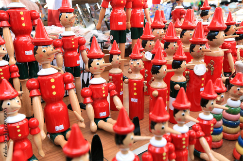Painted wooden souvenir dolls of the figure of Pinocchio