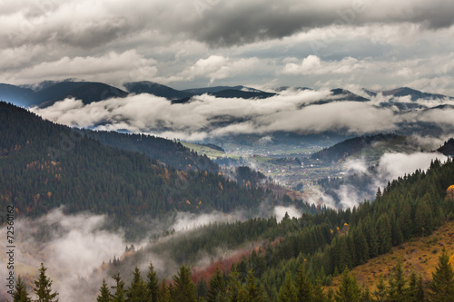 Fototapeta Naklejka Na Ścianę i Meble -  global warming. mountain landscape. Clouds and fog