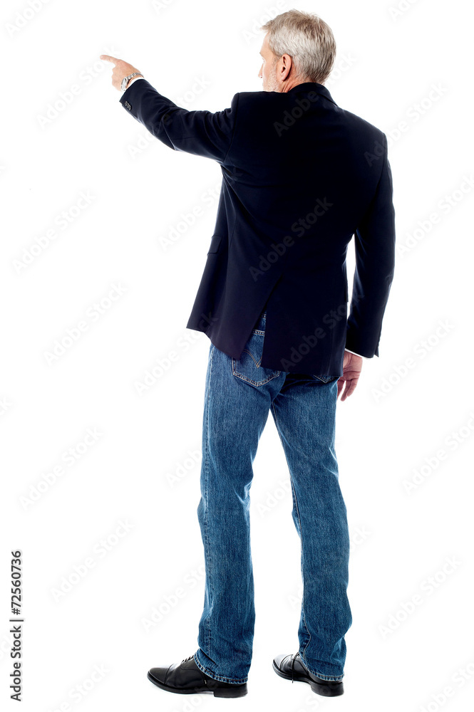 Senior business man pointing at something Senior business man pointing at something