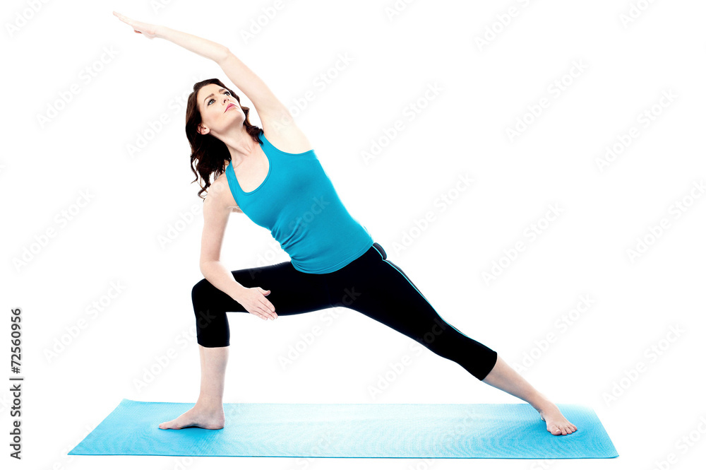 Young woman exercise over white background Young woman exercise over white background