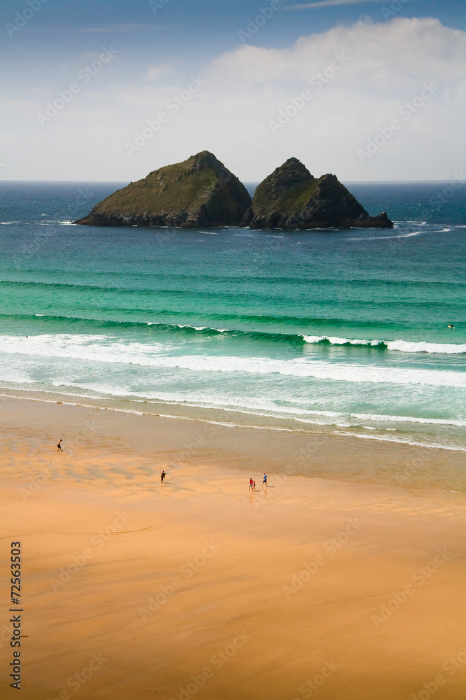 Fototapeta premium People on the beach in Holywell Bay, Cornwall, UK.