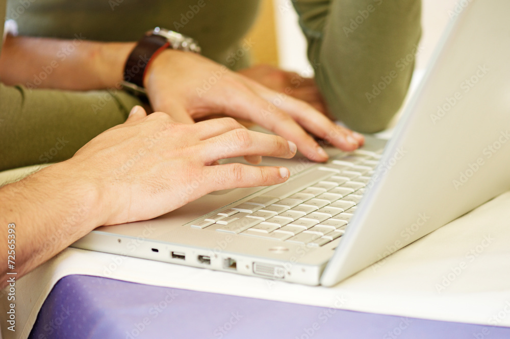 Man typing on the laptop Man typing on the laptop